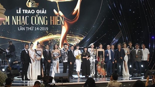 At the award ceremony in 2019 (Photo: VNA)