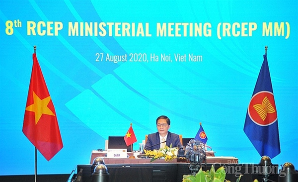 Minister of Industry and Trade Tran Tuan Anh speaks via a video conference held on Thursday. – Photo baocongthuong.vn