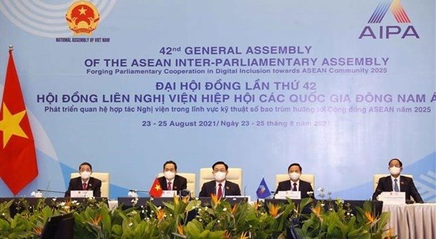 National Assembly Chairman Vuong Dinh Hue and other delegates of Vietnam attends the AIPA-42 opening ceremony via videoconference on August 23 morning. (Photo: VNA).