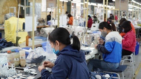Workers produce shoes for exports.(Photo:VNA).