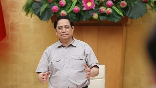 Prime Minister Pham Minh Chinh addresses the meeting (Photo: VNA).