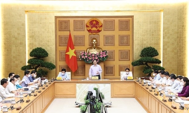 PM Pham Minh Chinh speaks at the event. (Photo: VNA).