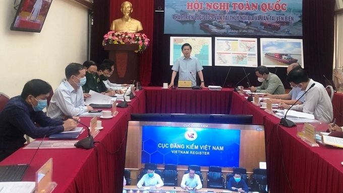 Minister of Transport Nguyen Van The speaking at the teleconference. (Photo: qdnd.vn).