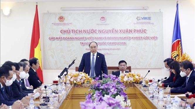 President Nguyen Xuan Phuc speaking at the meeting (Photo: VNA).