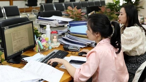 (Source: NDO)  Hanoi’s budget collection climbs nearly 25% in seven months - Illustrative photo (Photo: VNA).