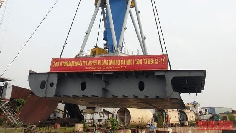 At the ceremony to begin the building of the cargo ship.