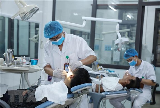 Khám chữa bệnh tại Chuyên Khoa Răng hàm mặt, Bệnh viện Đa khoa Sông Thương, Bắc Giang. (Ảnh minh họa: Danh Lam-TTXVN)