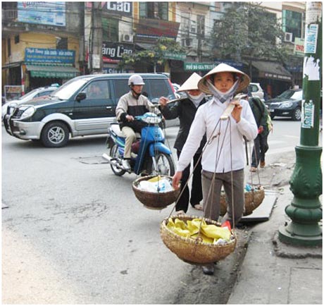 Những người buôn gánh bán bưng  cũng có thể tham gia BHXH.