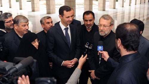  Lãnh đạo Syria và Iran trước báo giới. Ảnh: Reuters