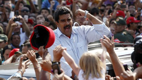 Ứng cử viên Tổng thống Nicolás Maduro trong niềm vui chiến thắng. Ảnh: Reuters