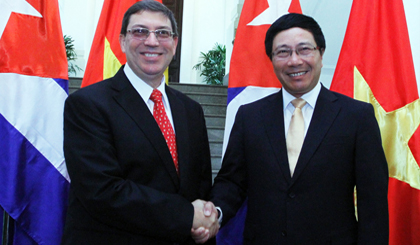 Deputy PM, FM Pham Binh Minh and top Cuban FM Bruno Rodriguez Parrilla, Ha Noi, September 10, 2014 - Photo: VGP