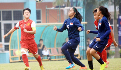 Vietnam’s captain Le Hoai Luong (left) impresses Singapore’s coach Hyrizan with a five-goal tally.