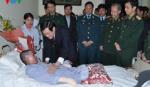 President visits only survivor of helicopter crash