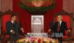Party General Secretary hosts Lao Deputy Prime Minister