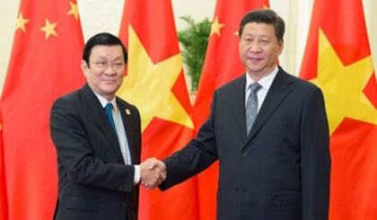 Vietnamese President Truong Tan Sang and his Chinese counterpart Xi Jinping at the APEC Summit in Beijing last year
