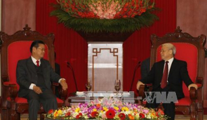  Party General Secretary hosts Lao Deputy Prime Minister