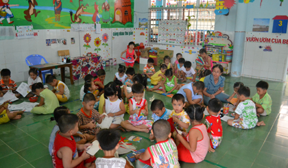 VCEFA has set a target of ensuring all children receive high quality primary education. Photo: Huu Chi