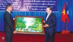 Tien Giang leader meets with Khammouane Province's province