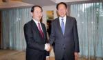 Politburo member and Minister Tran Dai Quang visits Singapore