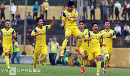 Nghe An players celebrate their opening goal.