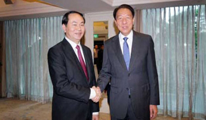 Minister Tran Dai Quang (left) and Deputy PM Teo Chee Hean. (VOV)