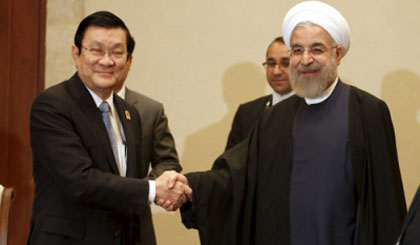 President Truong Tan Sang (left) and Iranian President Hassan Rouhani (Photo: VOV)