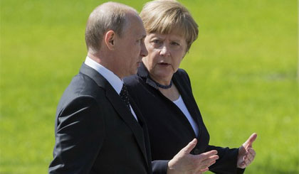 Tổng thống Nga Putin và Thủ tướng Đức Merkel. Ảnh: AFP