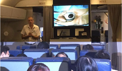 Live footage from the operating room is shown in the training room for trainees to follow