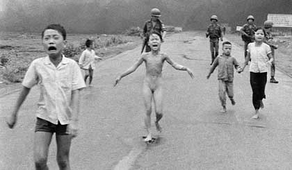 Nick Ut’s famous picture of a 9-year-old girl running scorched and naked from a napalm attack.