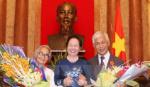 Professors Tran Thanh Van, Le Kim Ngoc receive Friendship medals