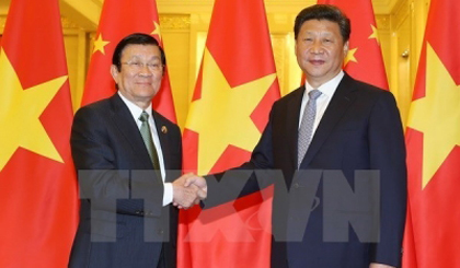 State President Truong Tan Sang meets Chinese Party General Secretary and State President Xi Jinping (Photo: VNA)