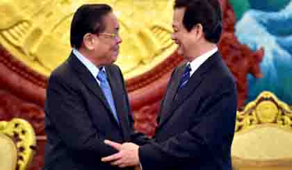 PM Nguyen Tan Dung meets Lao Party General Secretary and State President Chummaly Sayasone in Vientiane on September 14. (Image credit: VGP)