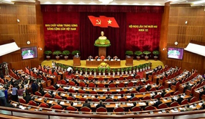 Party officials hear the Political Bureau’s presentation on the outcomes of the nomination of candidates for the 12th Party Central Committee in Hanoi on October 8. (Image credit: VGP)