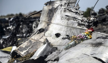 Xác máy bay MH17 gần làng Grabove, vùng Donetsk, miền Đông Ukraine ngày 26-7-2014. Nguồn: AFP/TTXVN