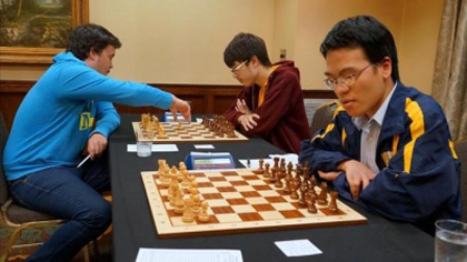 GM Le Quang Liem (right) is targeting to make the world's top 30 players.