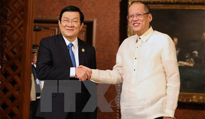 Tổng thống Philippines Benigno Aquino III hội đàm với Chủ tịch nước Trương Tấn Sang nhân dịp Hội nghị cấp cao APEC lần thứ 23. Ảnh: Nguyễn Khang/TTXVN