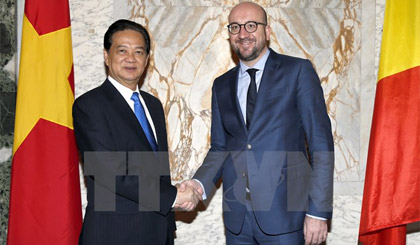 Thủ tướng Vương quốc Bỉ Charles Michel đón, hội đàm với Thủ tướng Nguyễn Tấn Dũng. Ảnh: Đức Tám/TTXVN