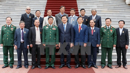 President Truong Tan Sang and delegates at the event (Photo: VNA)