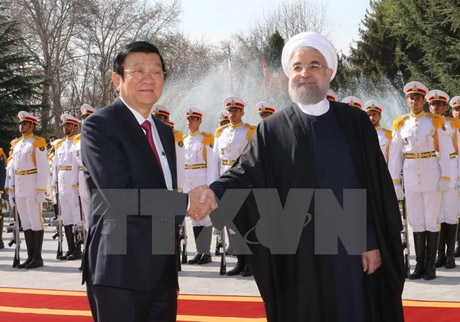 Tổng thống Iran Hassan Rouhani đón Chủ tịch nước Trương Tấn Sang. Ảnh: Nguyễn Khang/TTXVN