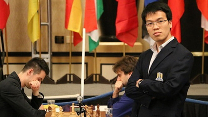 Le Quang Liem (right) contributes significantly to Vietnam’s second-place finish in the Open rapid chess category.