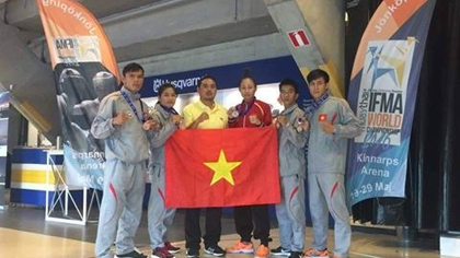 The Vietnamese muaythai athletes take home one gold, one silver and three bronze from the Sweden World Championship on May 28 (Photo: VNA)