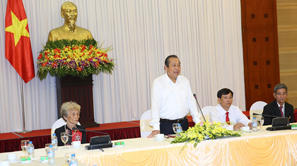 Deputy PM Truong Hoa Binh (centre) addresses the reception. (Photo: VGP)