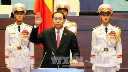 President Tran Dai Quang takes the oath of office the afternoon of July 25 (Photo: VNA)