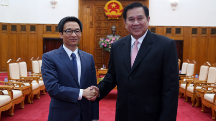 Deputy Prime Minister Vu Duc Dam and his Thai counterpart Thanasak Patimaprakorn (Photo: VGP)