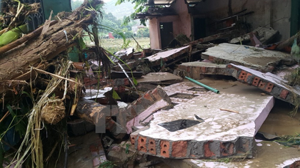 A house damaged by flash floods in Bat Xat district (Source: VNA)