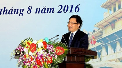 Deputy PM and FM Pham Binh Minh delivers his closing remarks at event on August 26. (Credit: VGP)