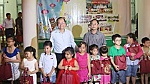 Presenting Mid-Autumn gifts to disadvantaged children