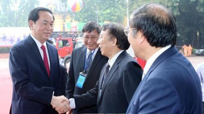 President Tran Dai Quang with the delegates (Photo: VNA)