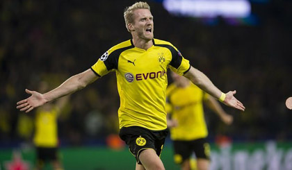 Andre Schurrle ghi bàn giúp Dortmund giật lại 1 điểm từ tay Real Madrid.