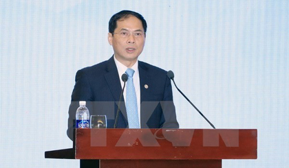 Vietnamese Deputy Foreign Minister Bui Thanh Son speaks at the ISOM in Hanoi on December 9 (Photo: VNA)